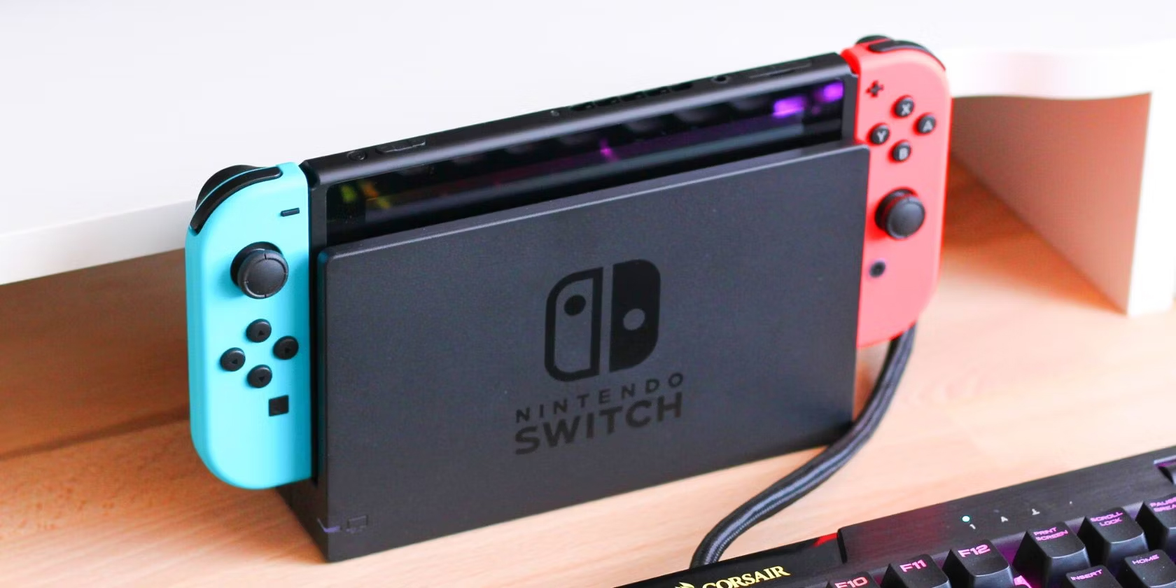 Close-up-of-a-nintendo-switch-docked-on-a-desk