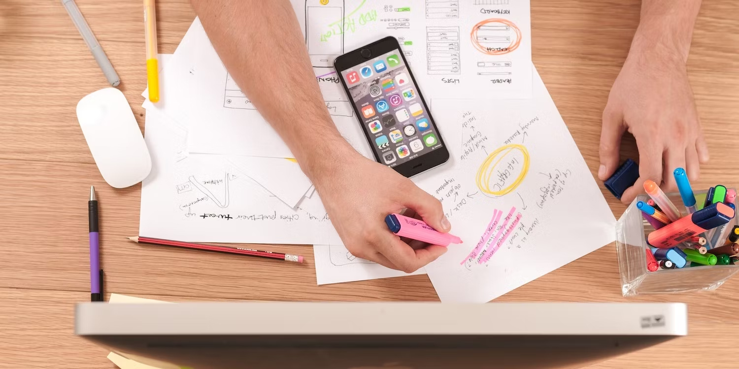 iPhone-and-Sheets-of-Scribble-on-a-Table